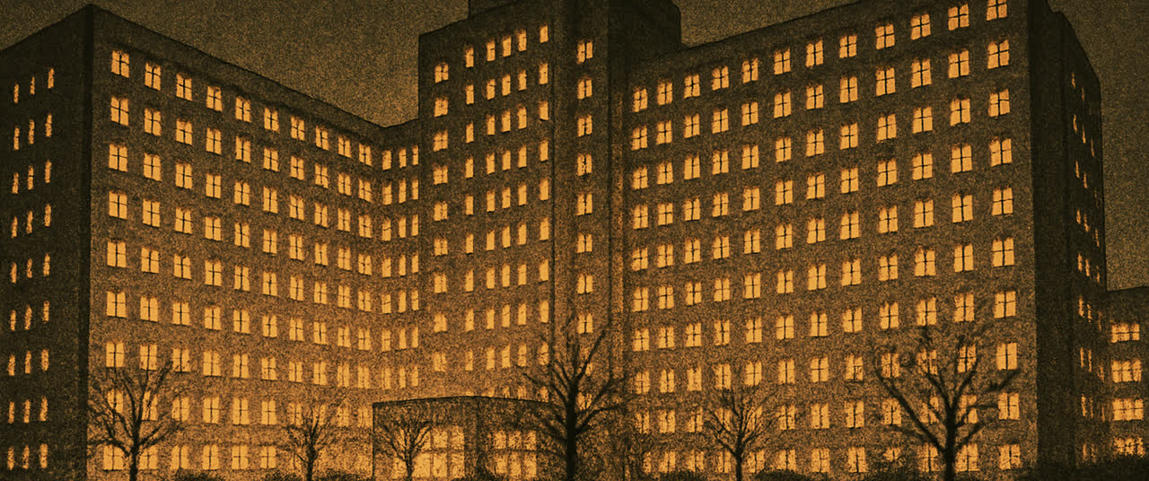 Reconstruction frame A1: Enormous institutional hospital building at night seen from below, too large for frame, hu